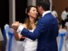 Couple dance to a romantic waltz song at their wedding